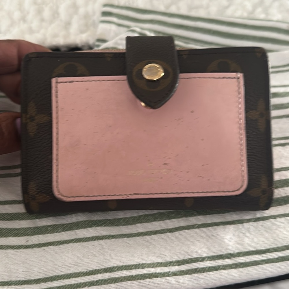 Louis Vuitton 
Pink rose juliette wallet lightly used